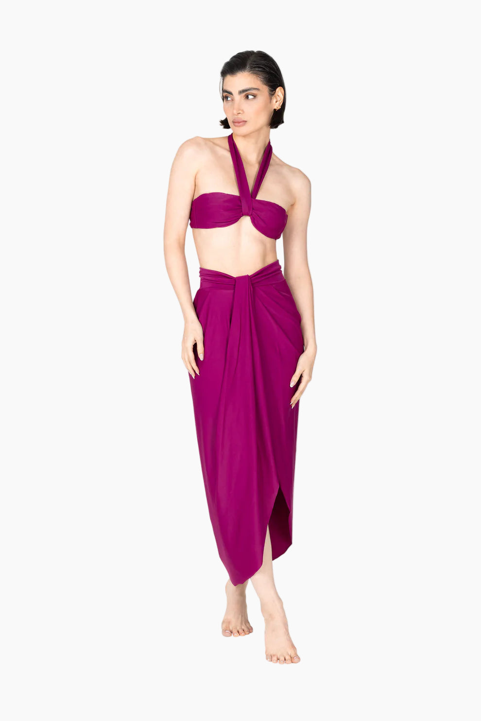 Woman in a 4-piece outfit purple bikini set , with a long matching cover up