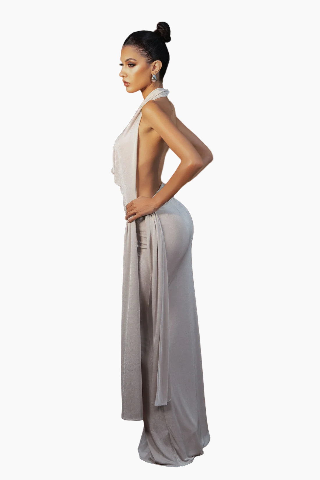 Woman wearing a white and gray dress on a white background