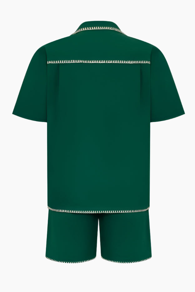 Green outfit with white trim