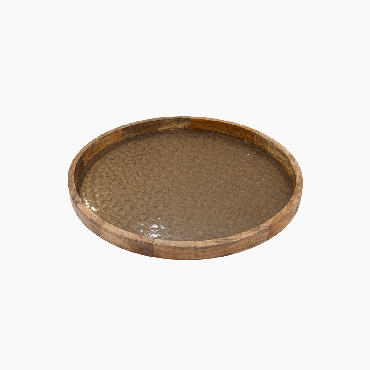 Round wooden tray with a textured surface on a white background