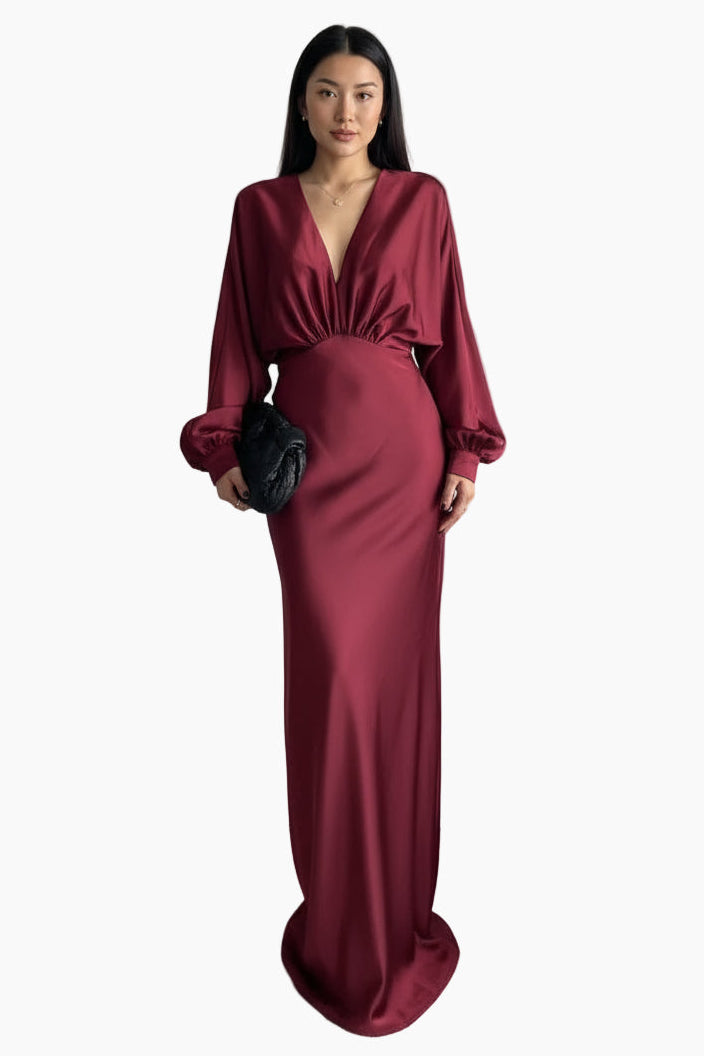 Woman wearing a burgundy evening gown