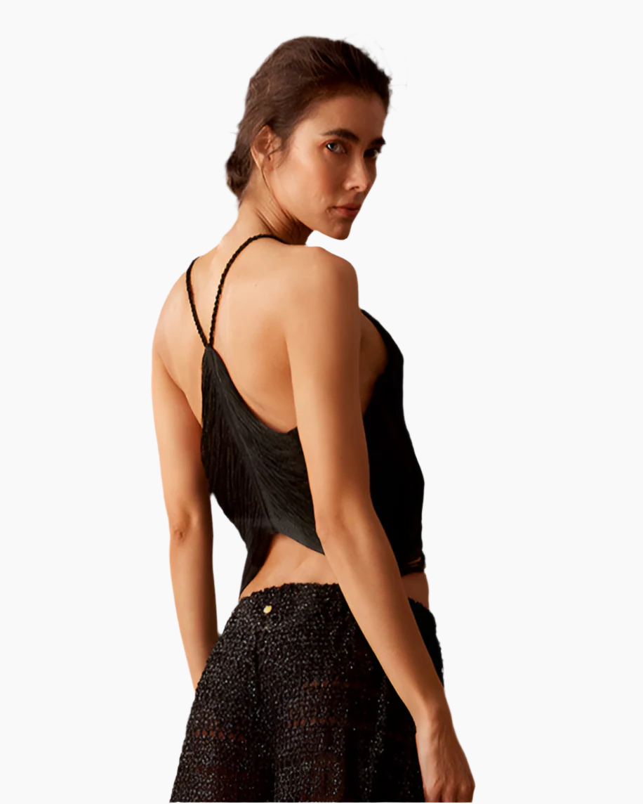 Woman wearing a black halter top