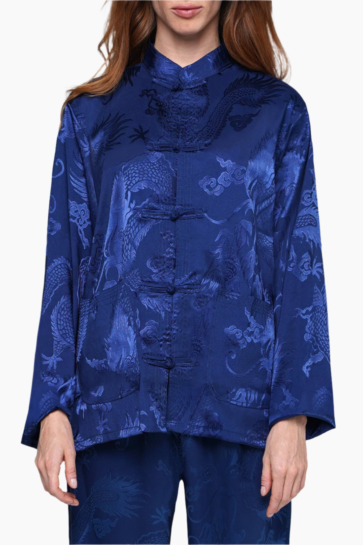 Woman wearing a blue patterned top and pants