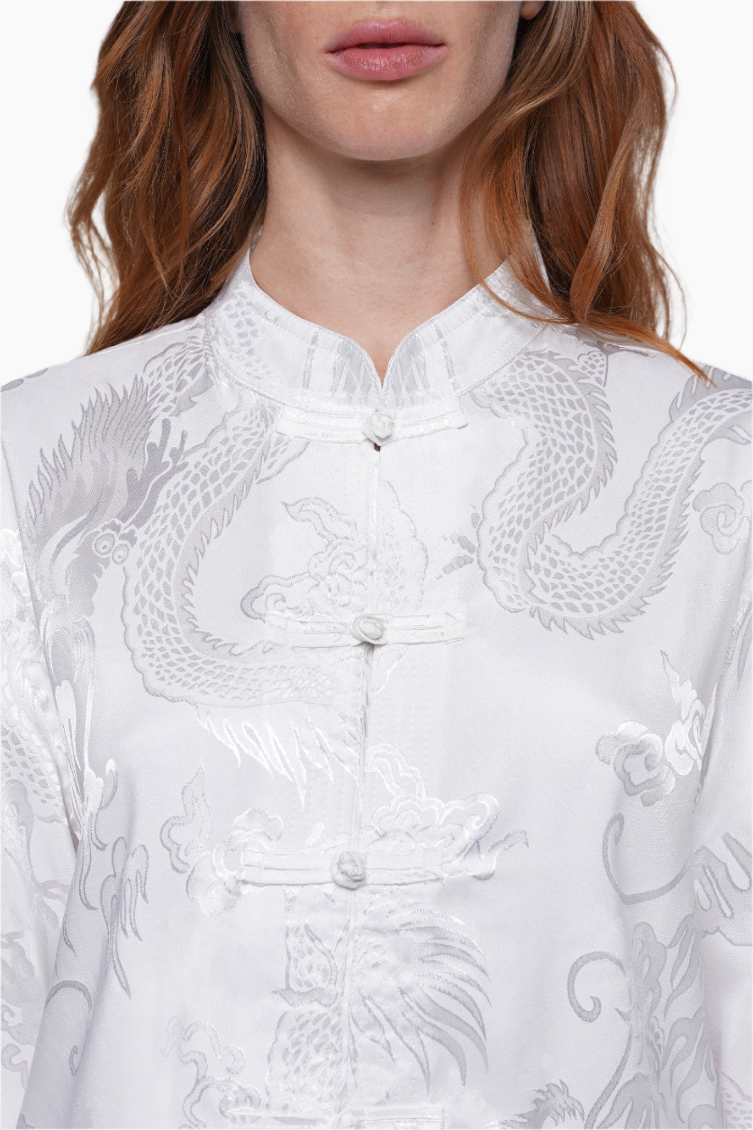 White embroidered shirt with dragon design