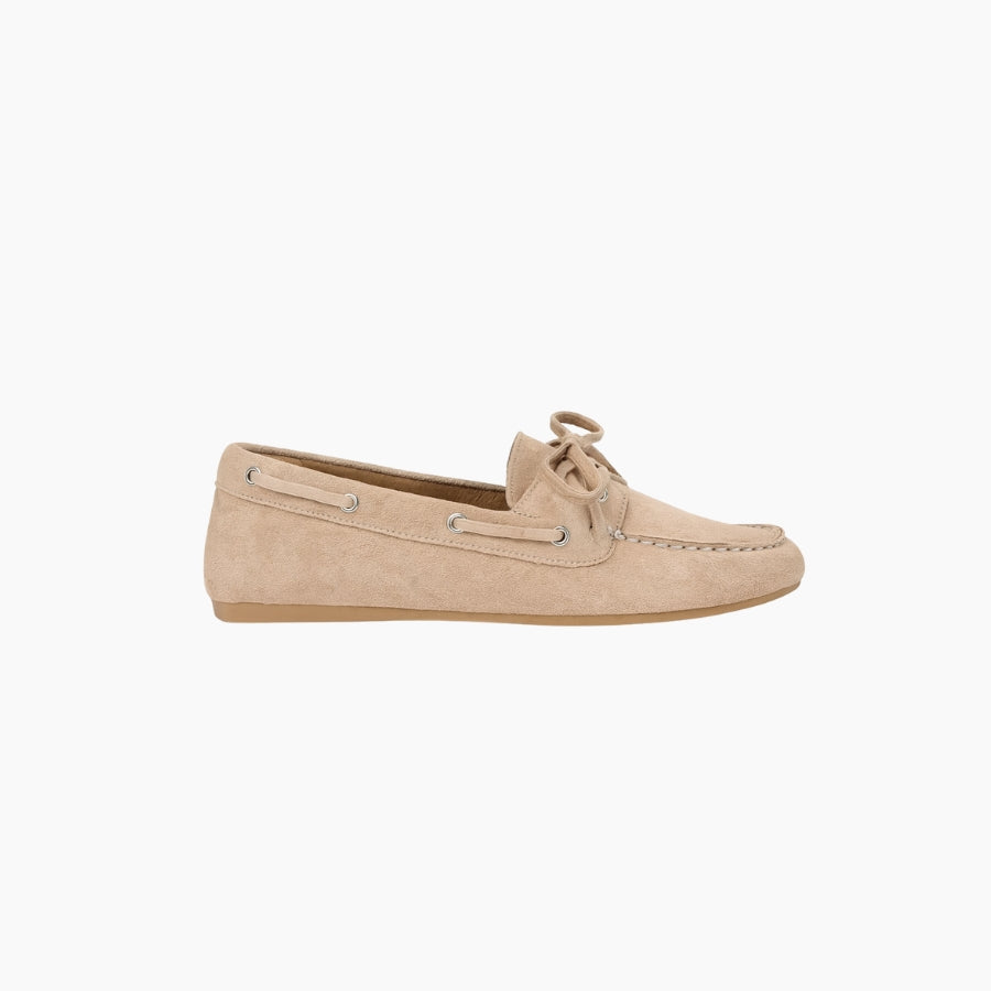 Beige suede loafer shoe on a white background