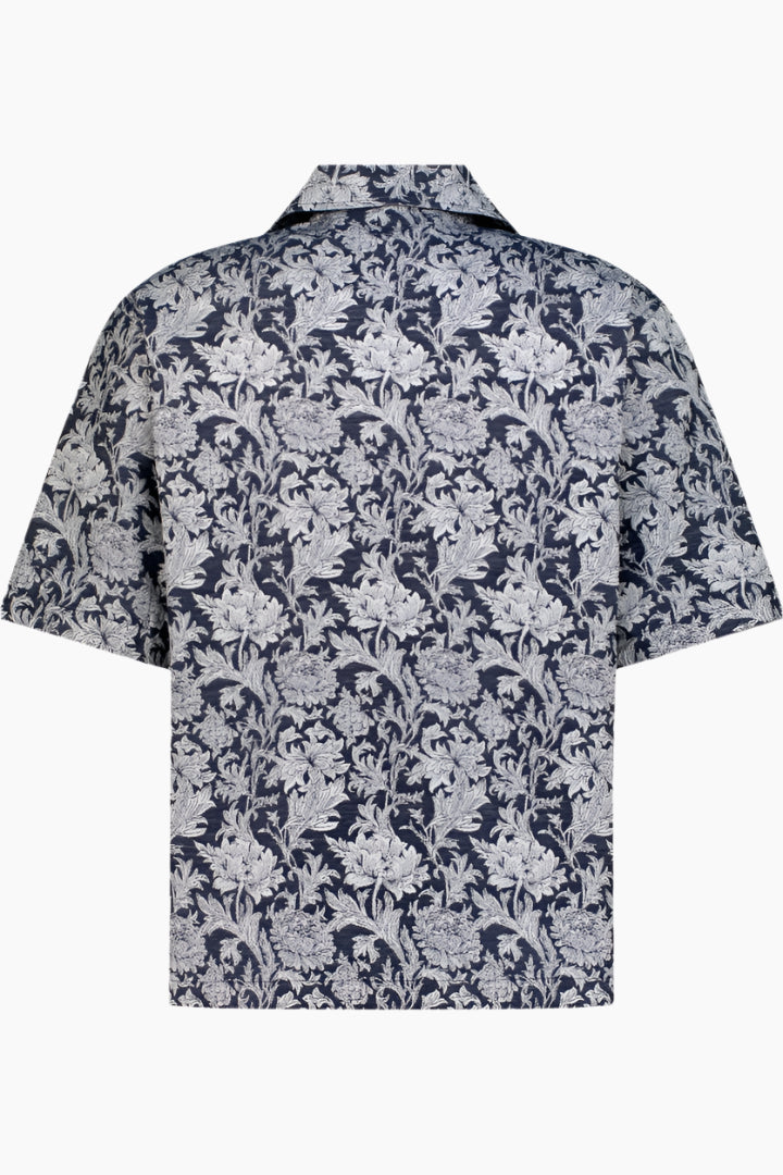 back shot of a Floral patterned shirt in light bleu and navy