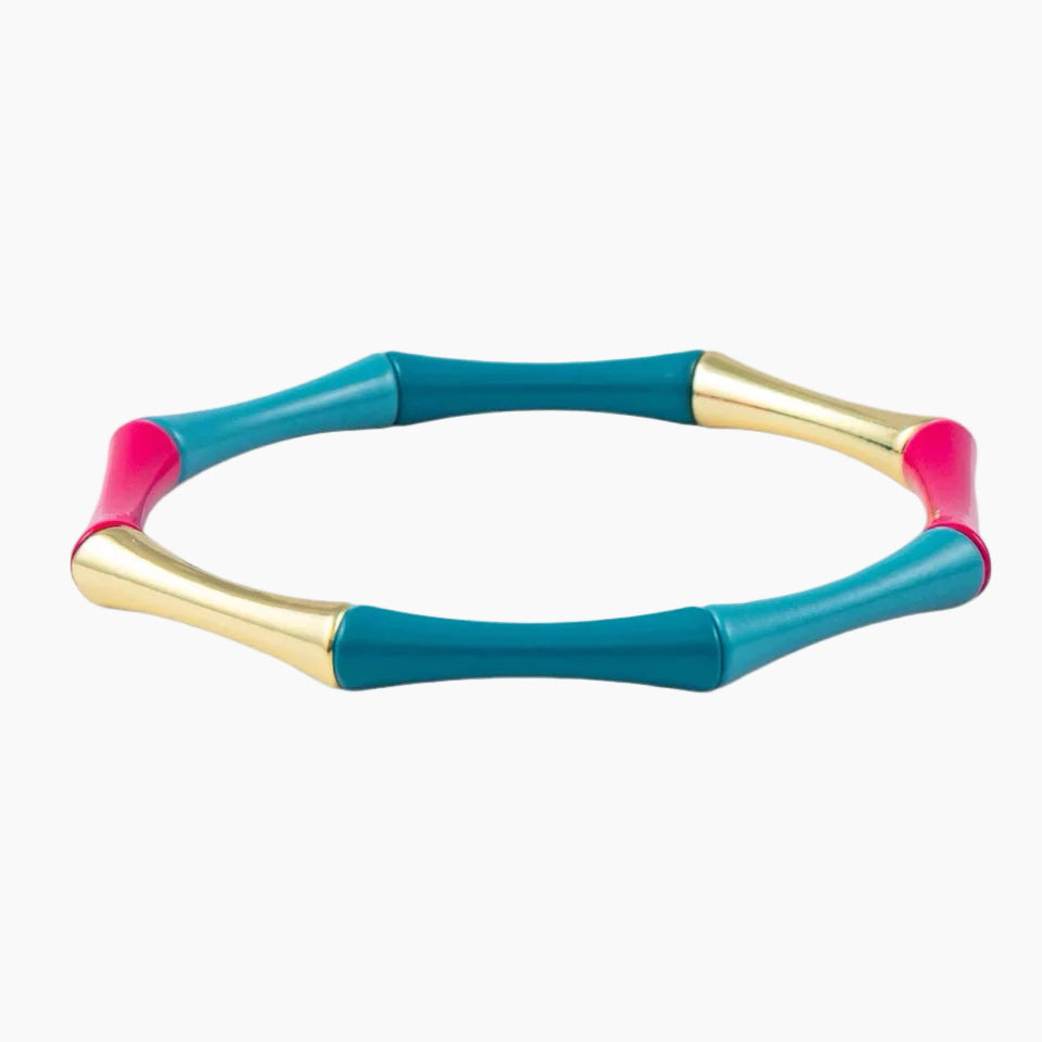 Colorful bracelet with blue, pink, and gold sections on a white background
