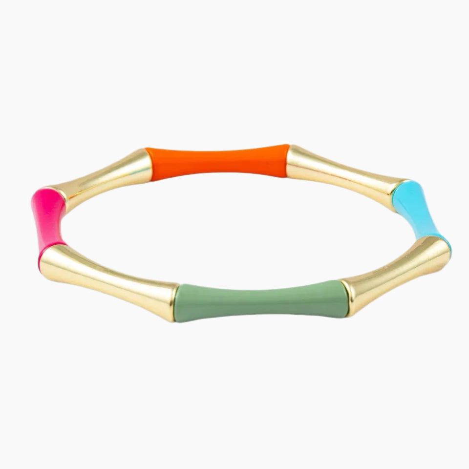 Colorful bracelet with gold accents on a white background
