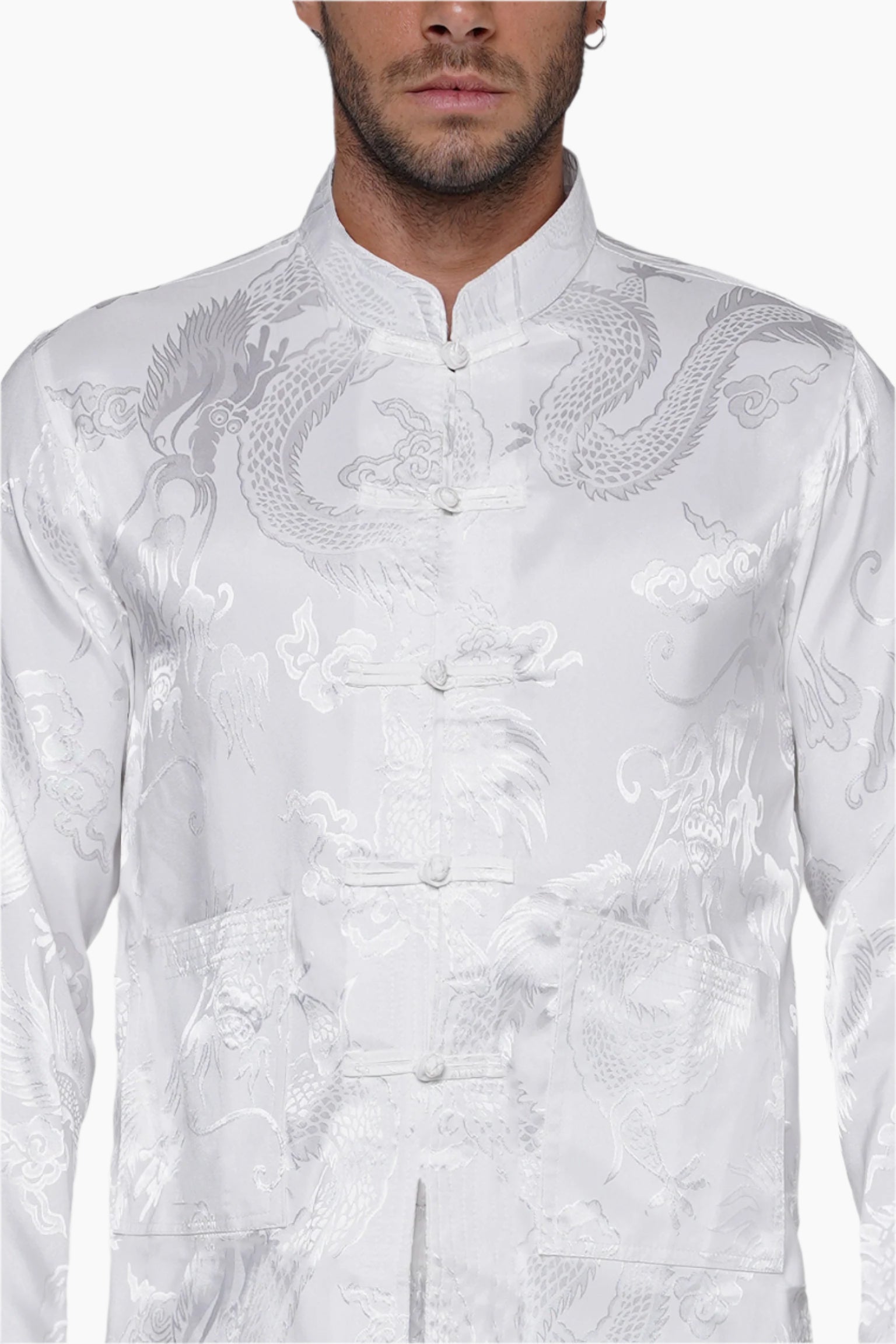 White embroidered traditional outfit with dragon design