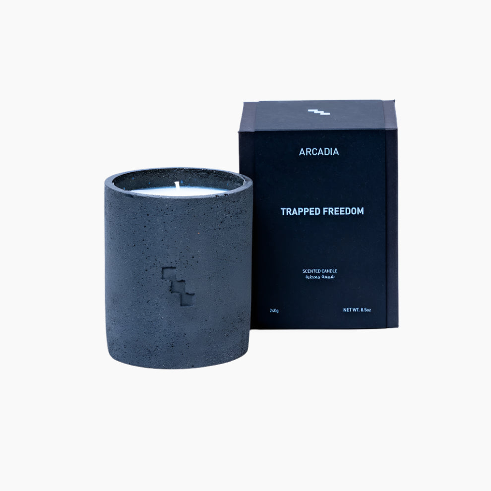 Dark gray concrete candle with 'Arcadia' branding , OUD, VANILLA