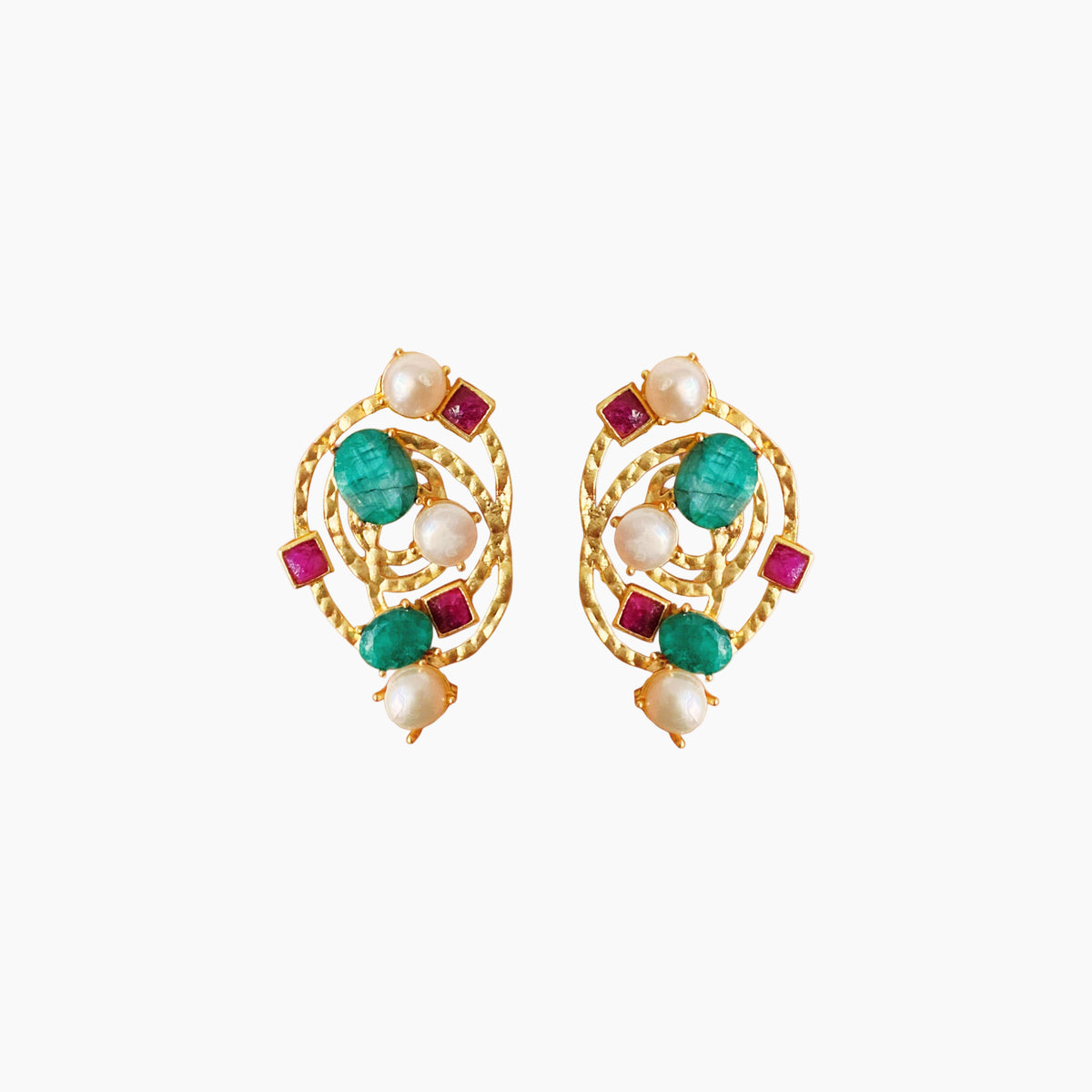 Pair of gold earrings with green, red, and pearl stones on a white background