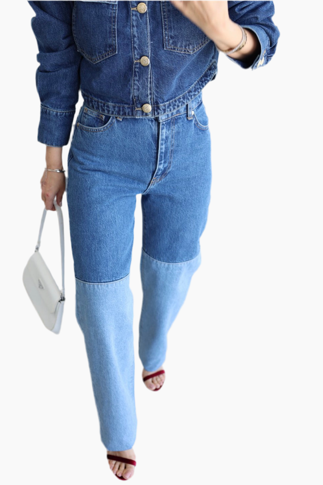 Person wearing a denim outfit with a white background