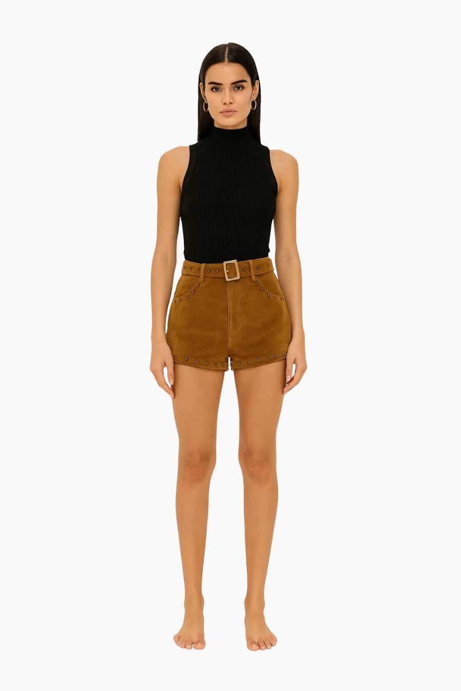 Woman wearing a black sleeveless top and brown shorts