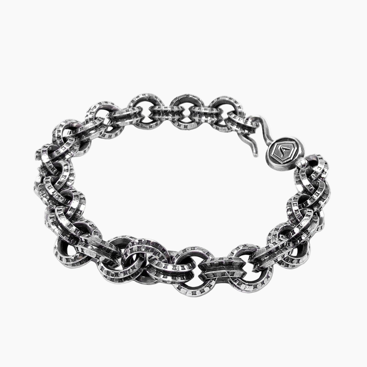 Silver chain bracelet on a white background