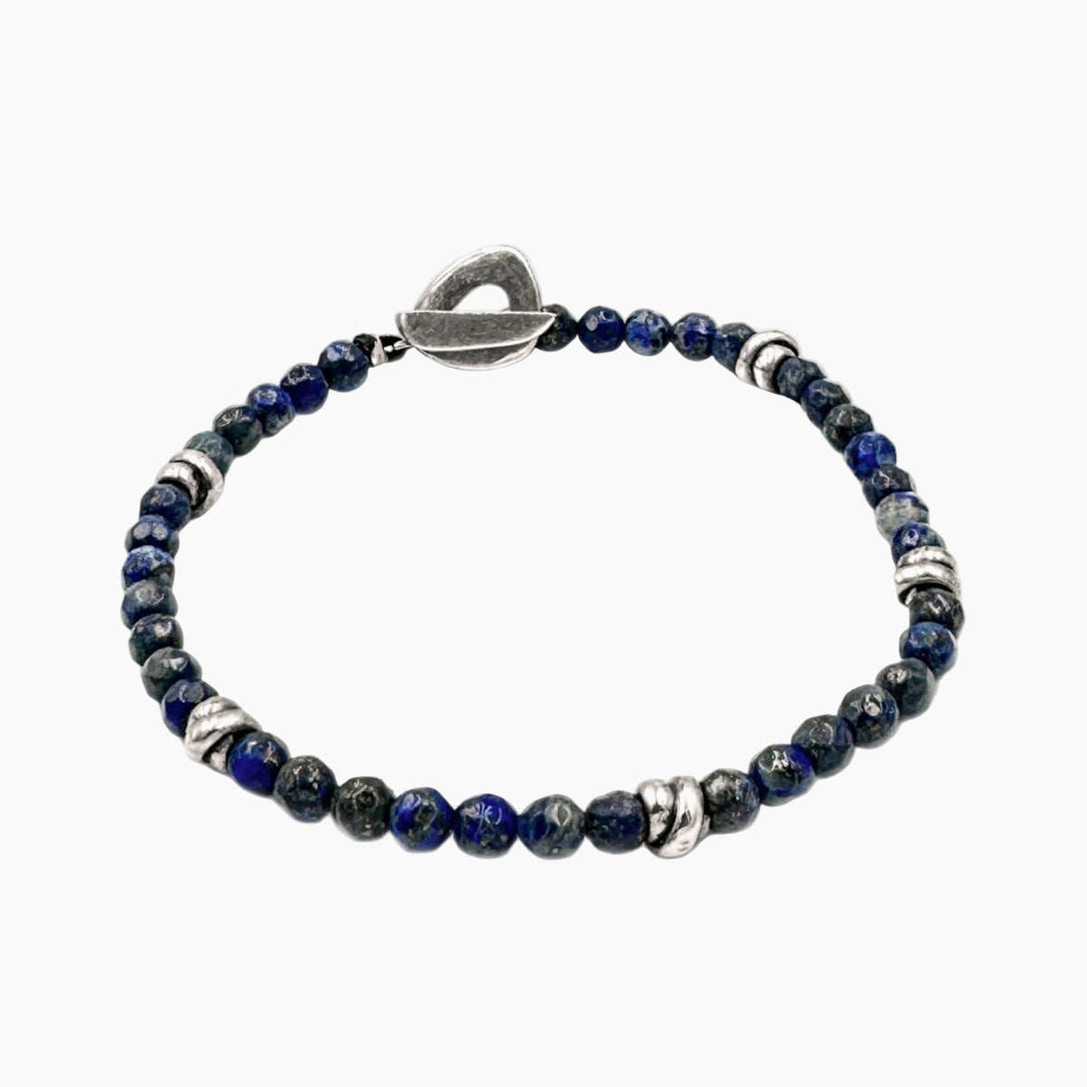 Bracelet with blue beads and silver accents on a white background