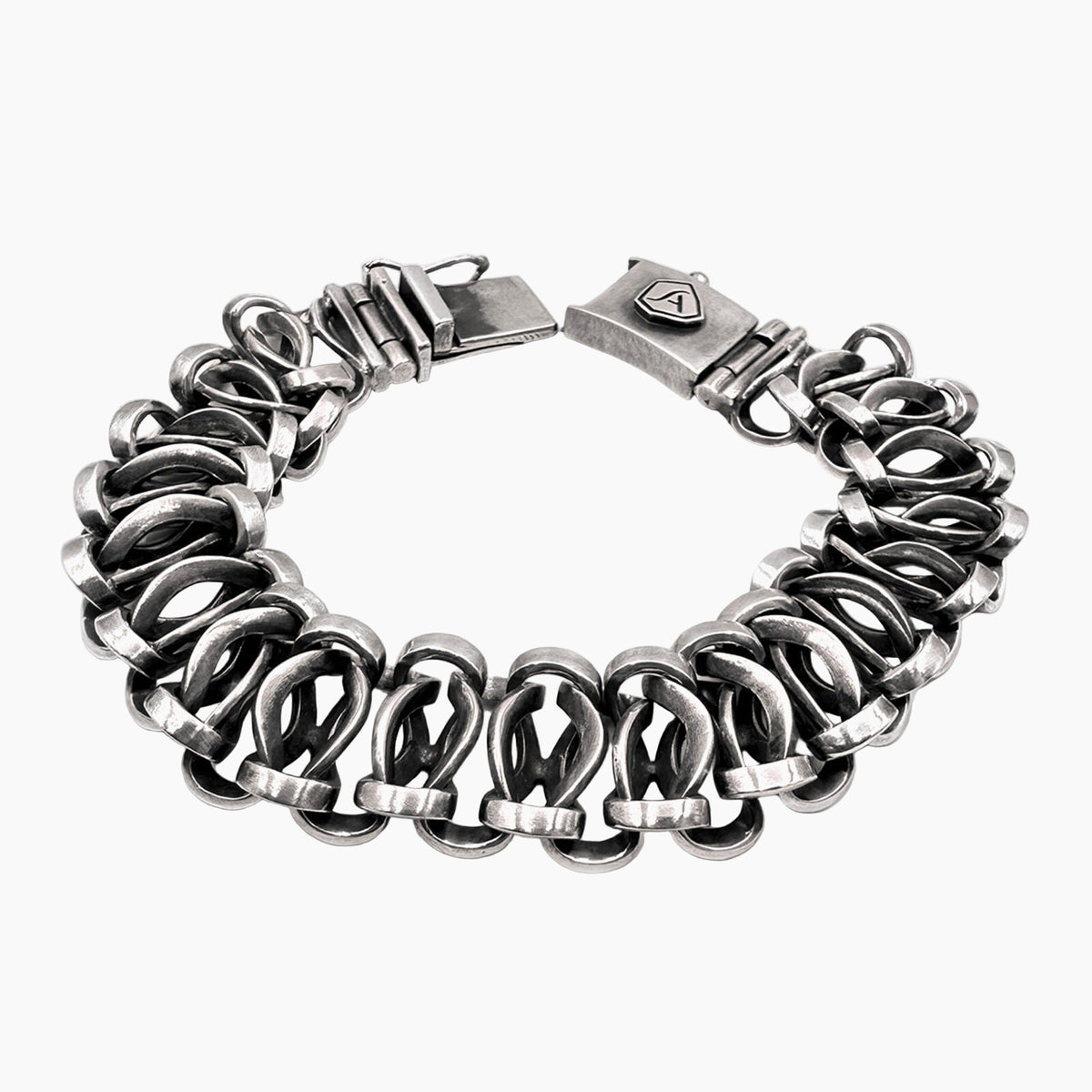 Silver chain bracelet on a white background