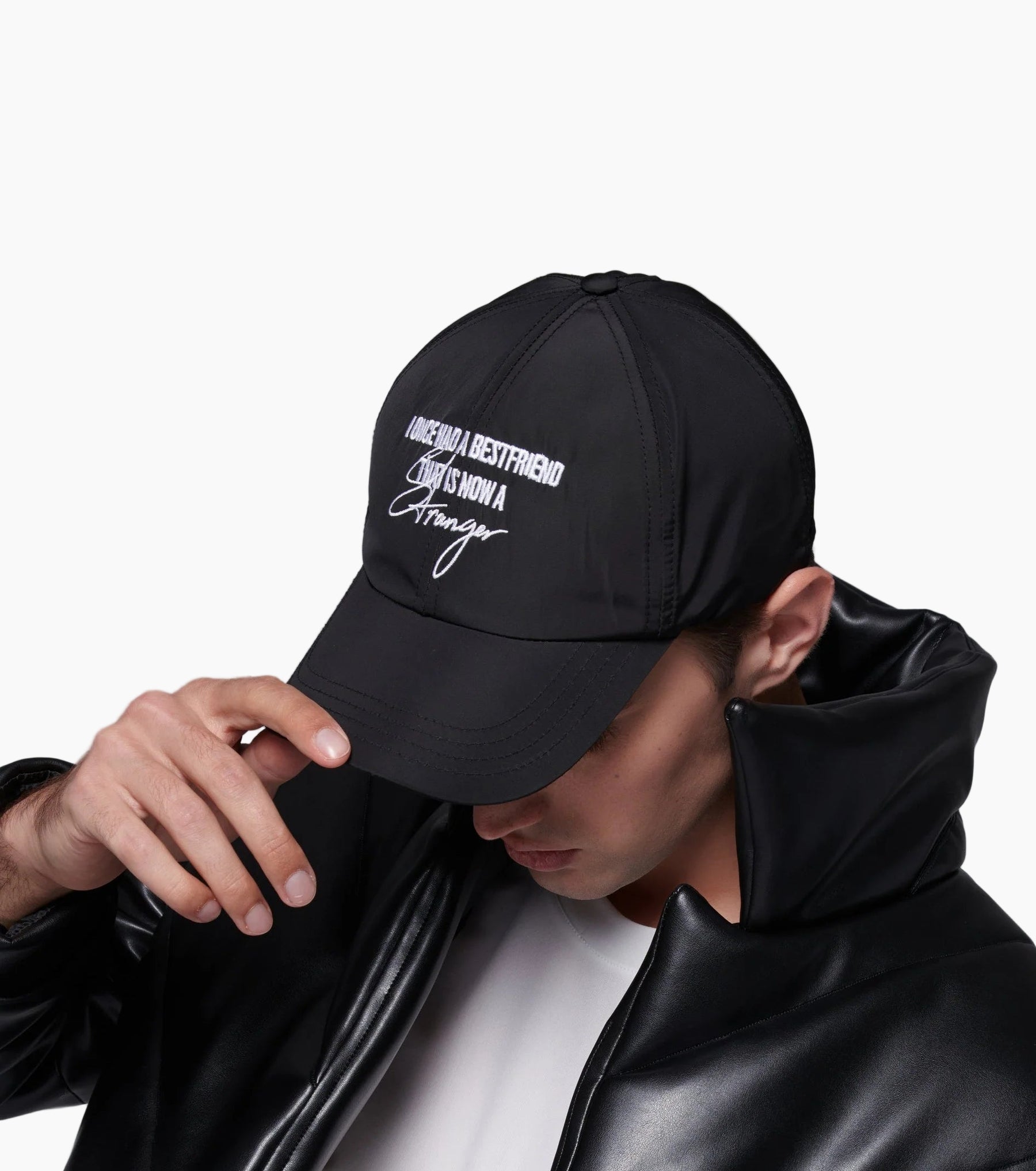 model wearing a Rain-protective baseball hat with a hand-embroidery