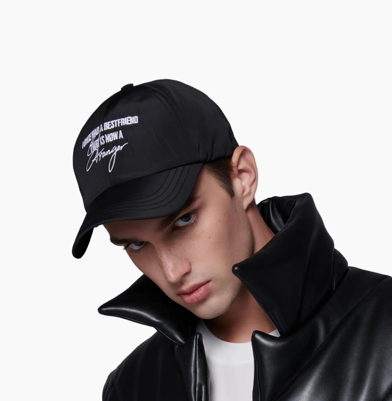 model wearing a Rain-protective baseball hat with a hand-embroidery