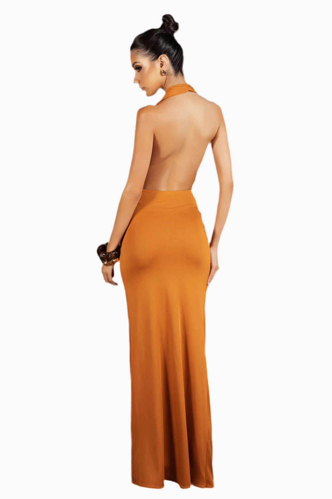 Woman wearing an orange halter neck dress