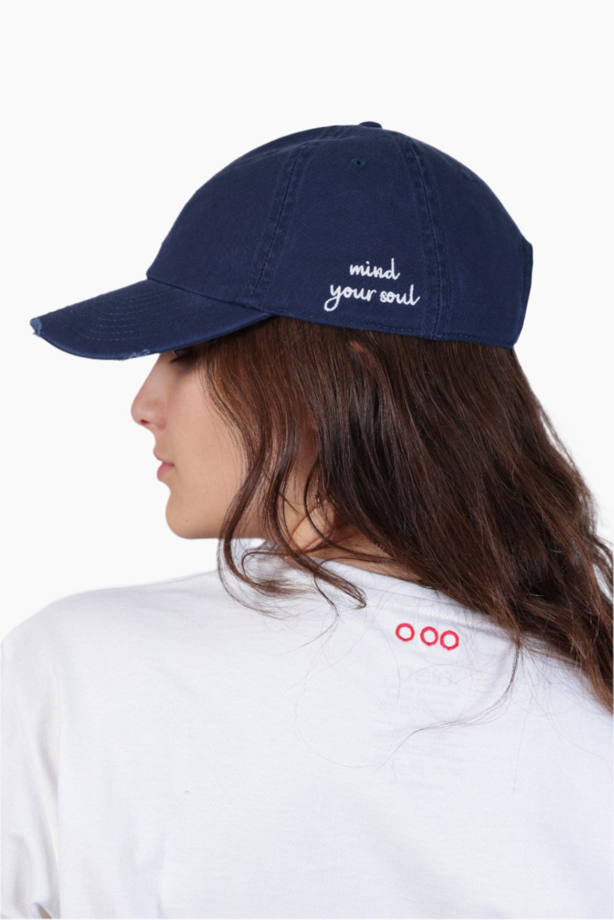 Person wearing a navy blue cap "Mind your Soul" - Unisex Cap