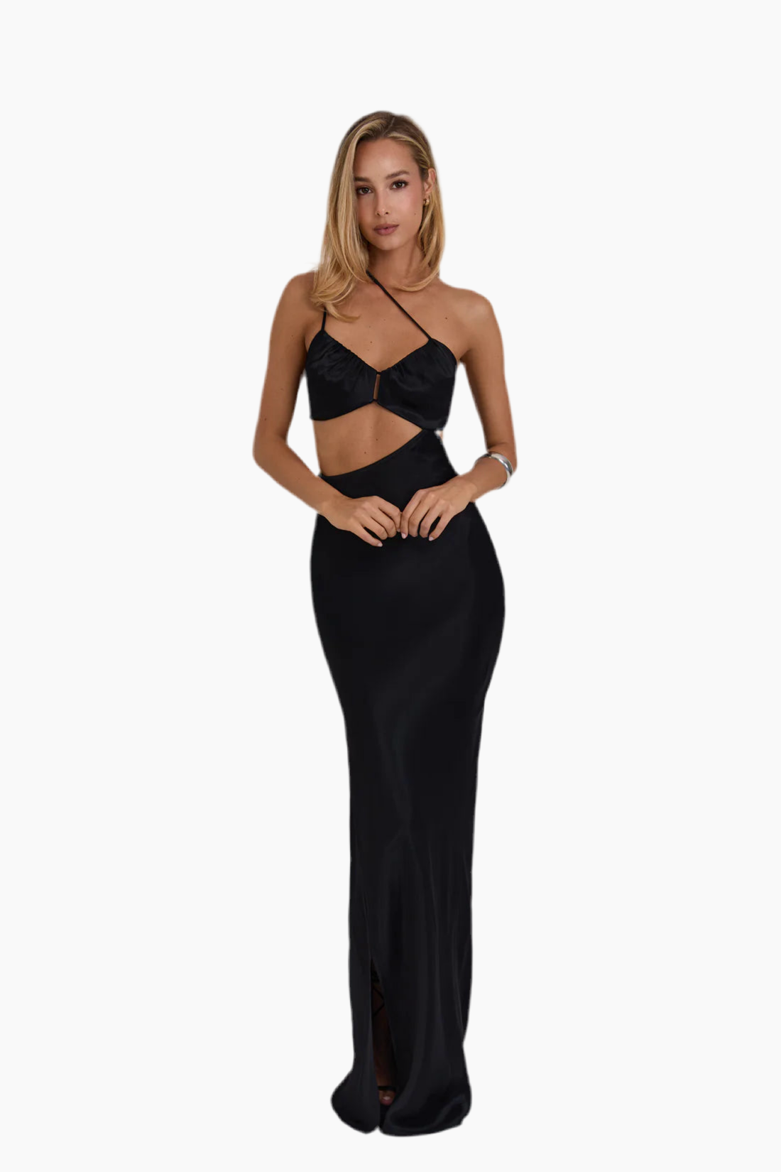 Woman wearing a black dress with cut-out design.