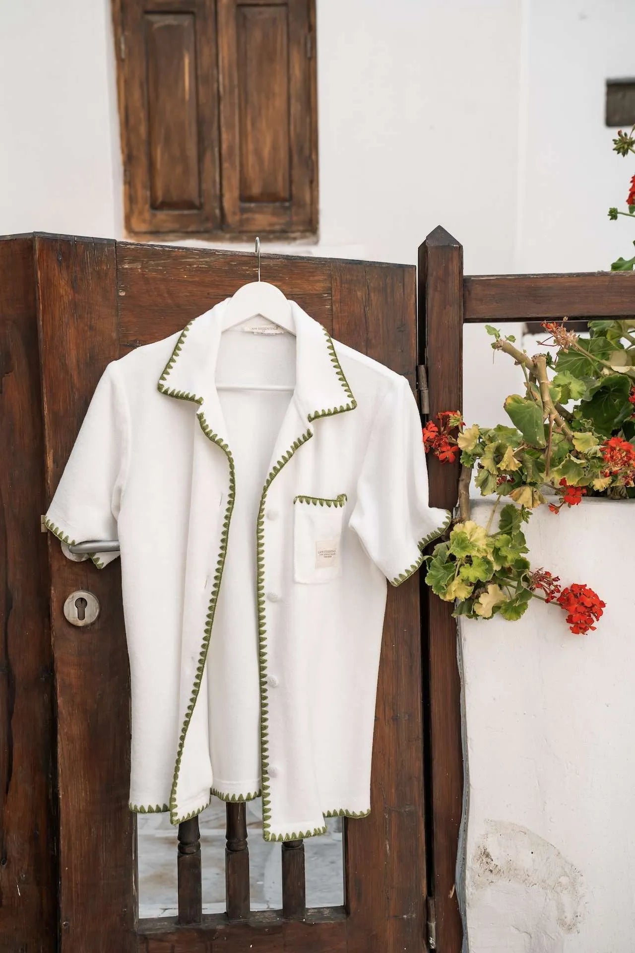white shirt with green trim , Terry Towelling set embodies comfort and elegance.
