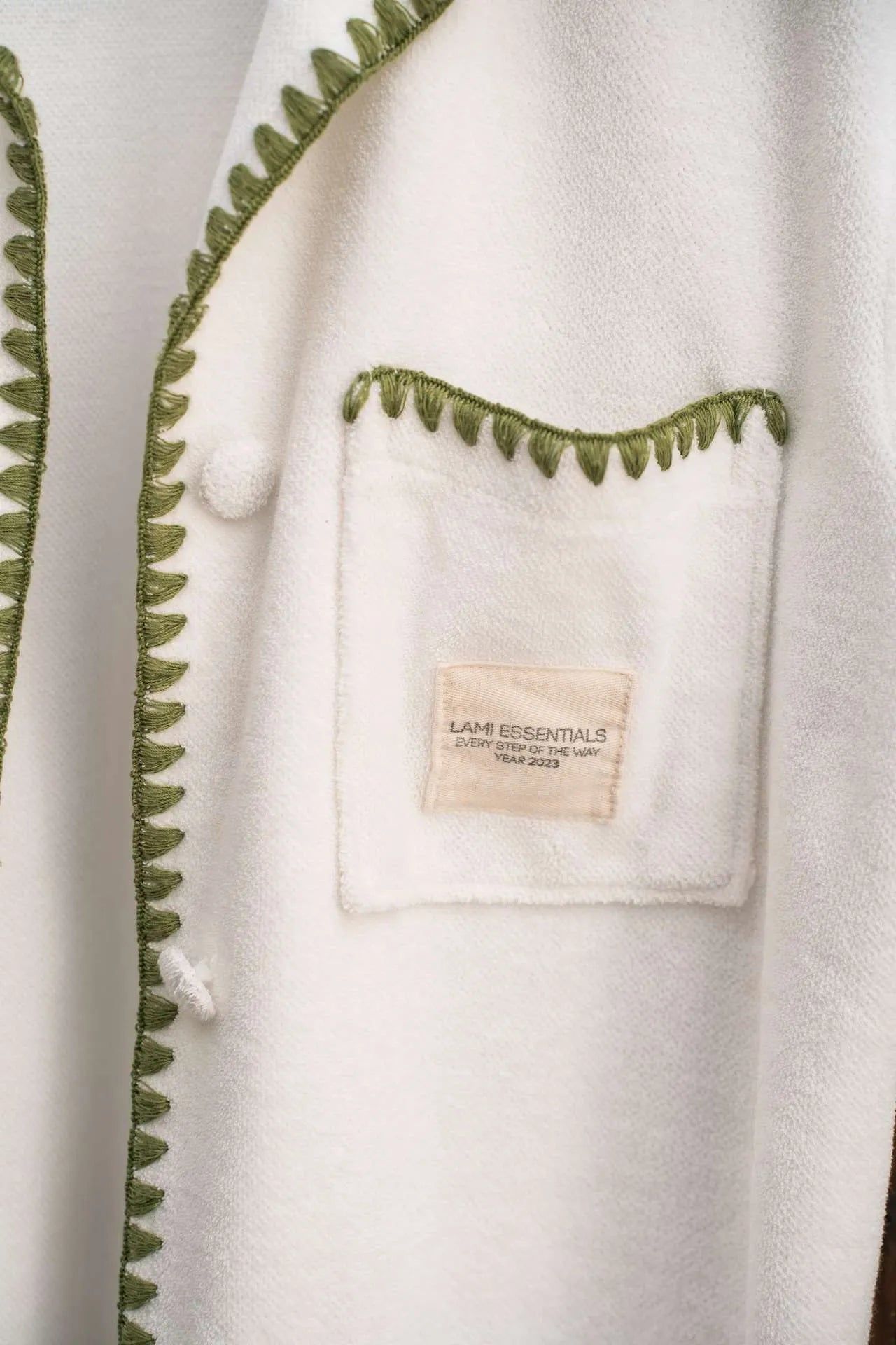 white outfit with green trim , Terry Towelling set embodies comfort and elegance.