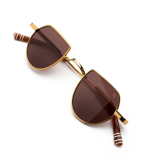 Sunglasses with gold frame and brown lenses , white stripped arms