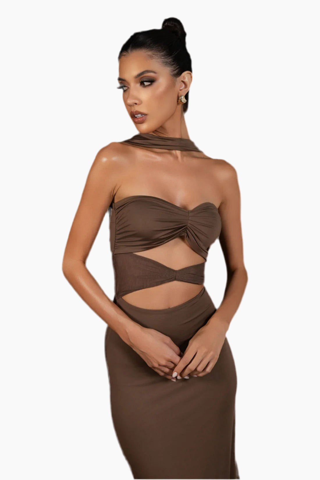 Woman wearing a brown strapless dress with cut-out design.