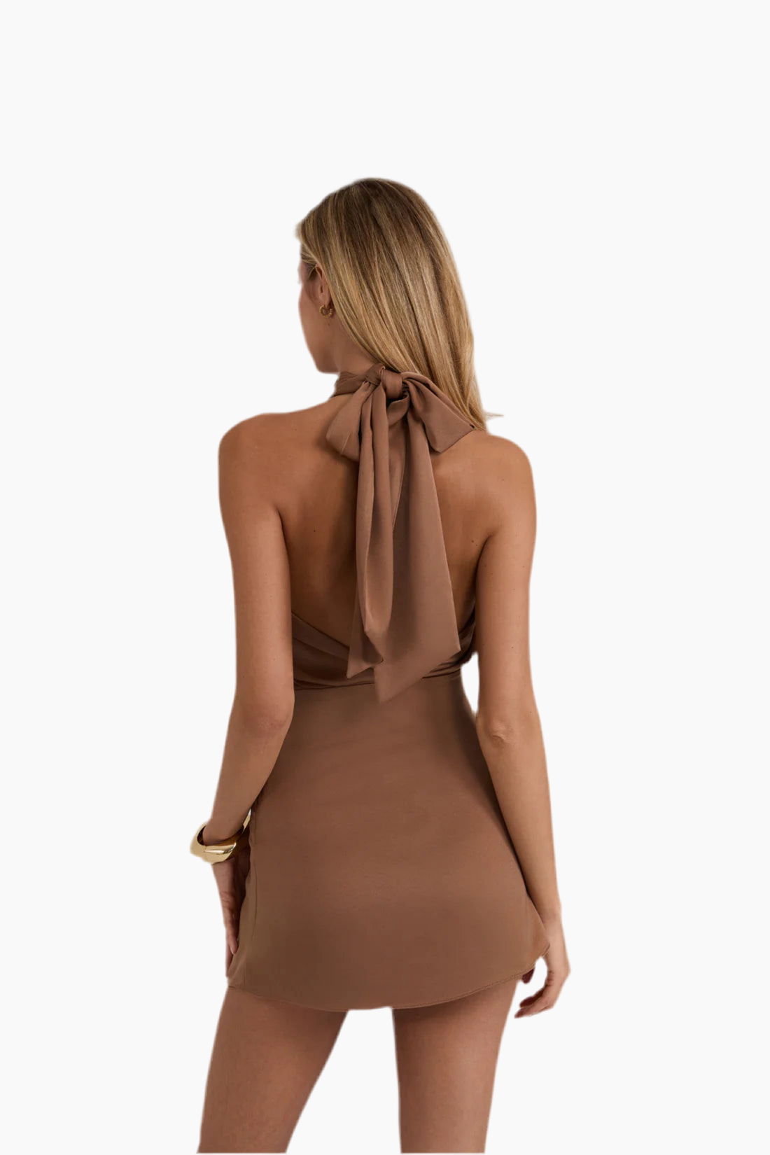 Woman wearing a brown dress with a halter neck design