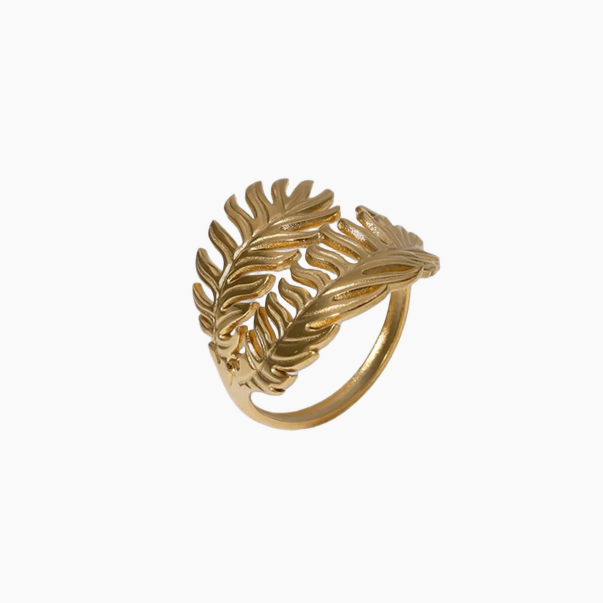 Gold leaf-shaped ring on a white background