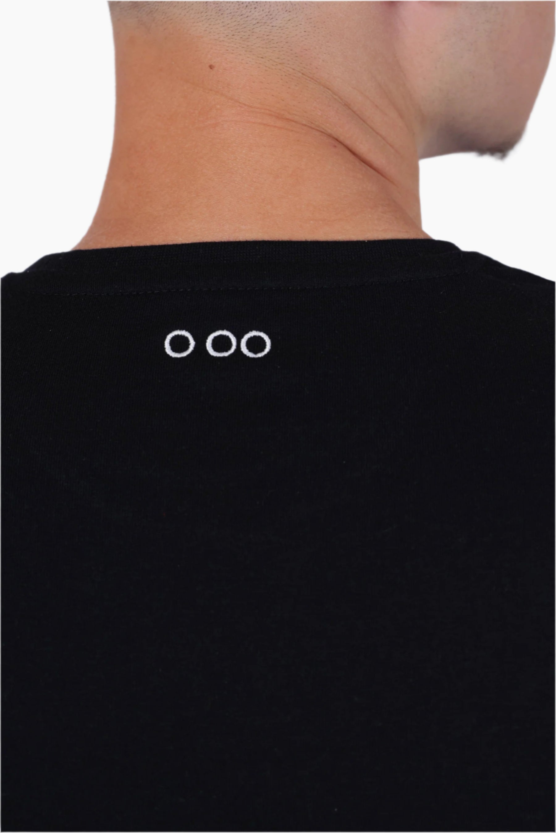 Black t-shirt with a logo on the back