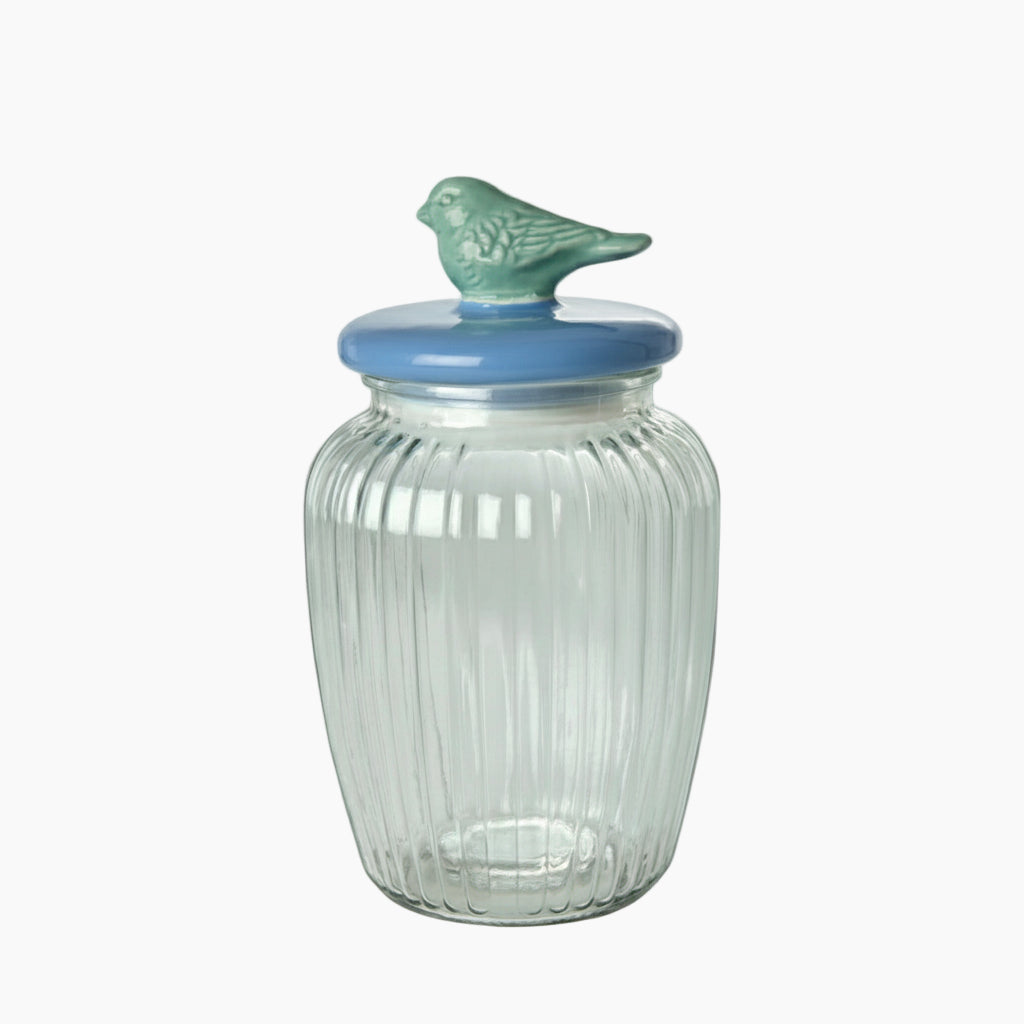 Clear glass jar with a bird-shaped lid