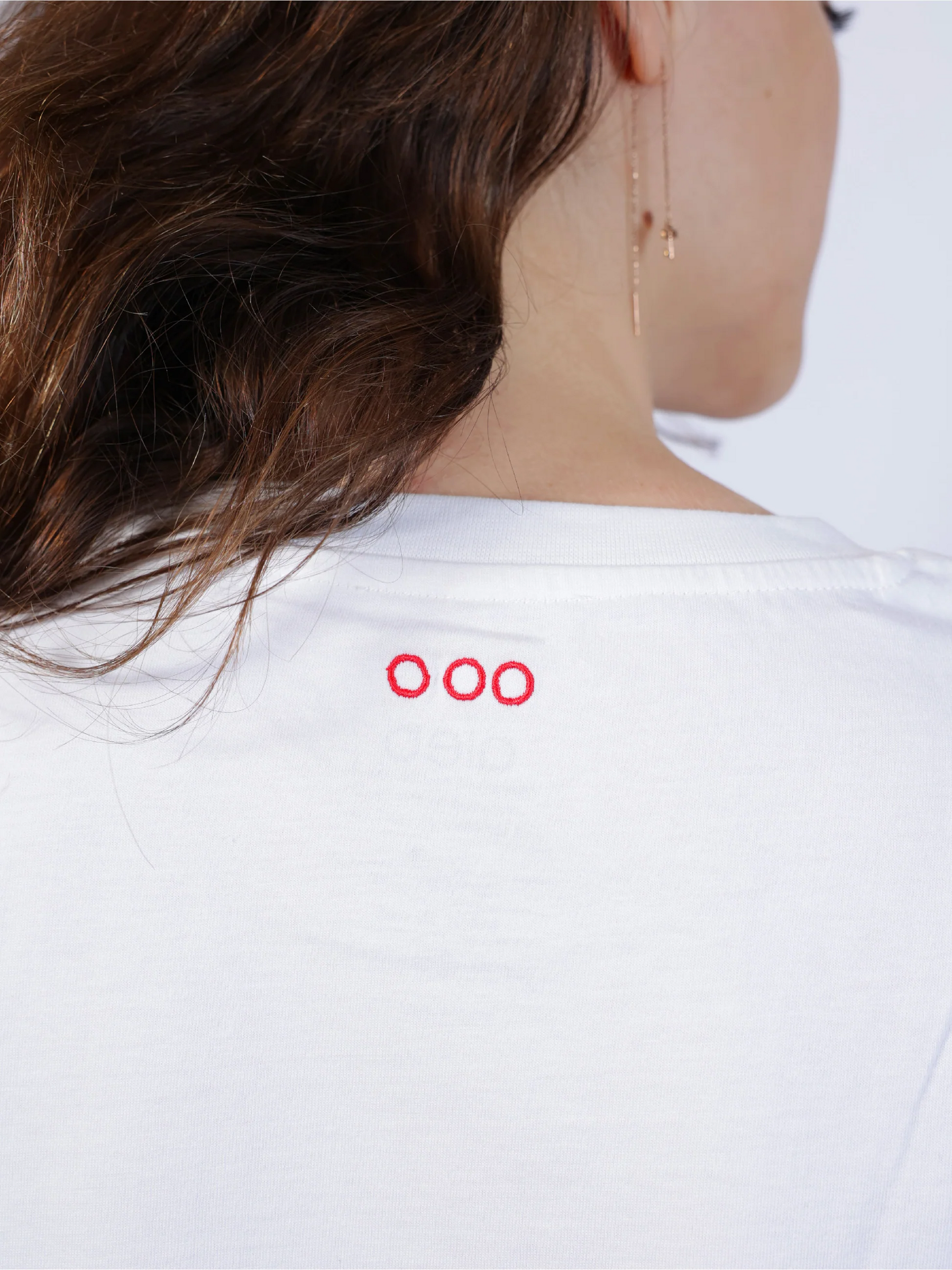 white shirt with a logo