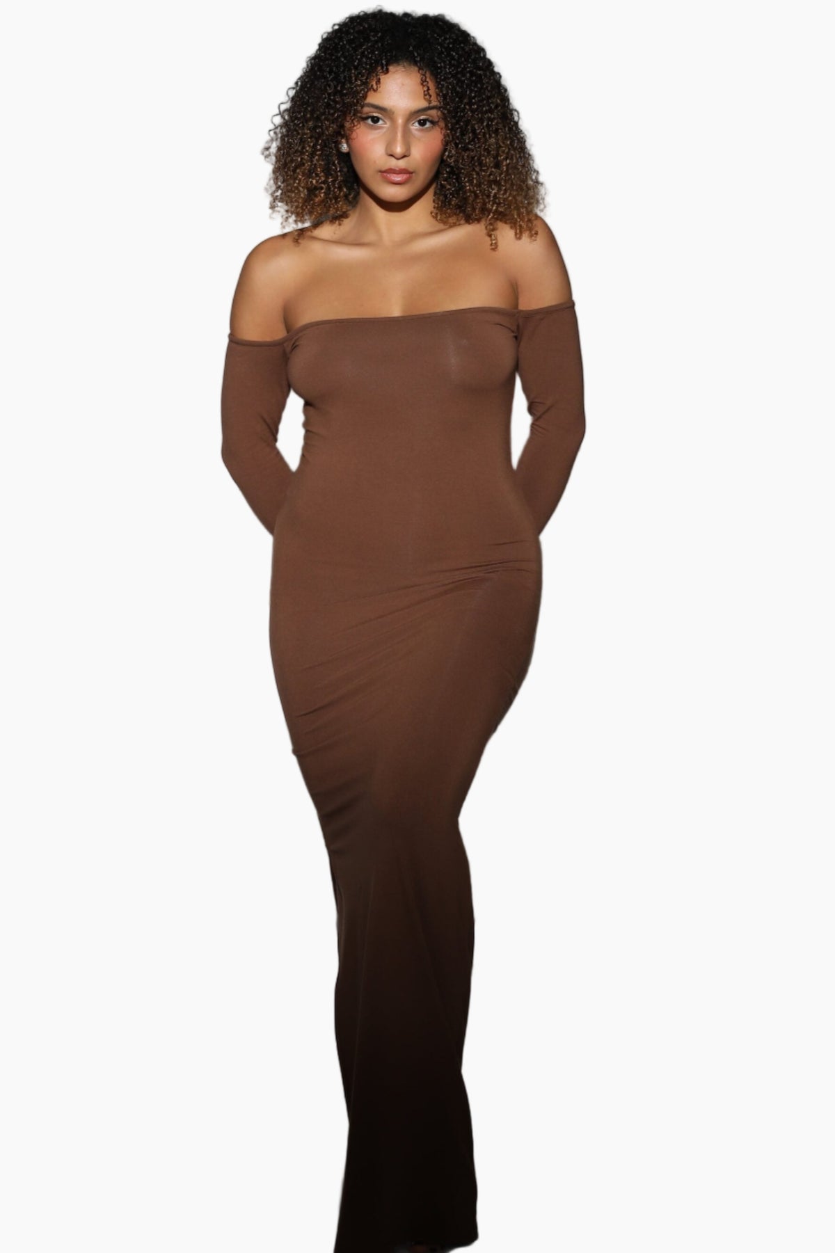 Woman wearing a brown off-shoulder dress