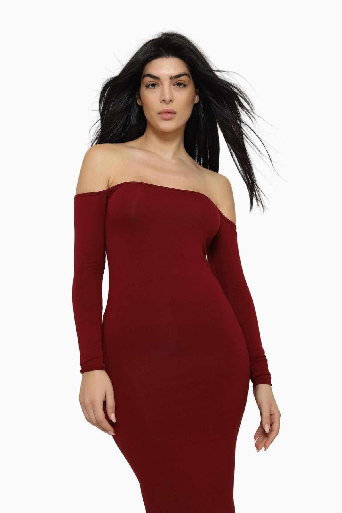Woman wearing a burgundy off-shoulder dress