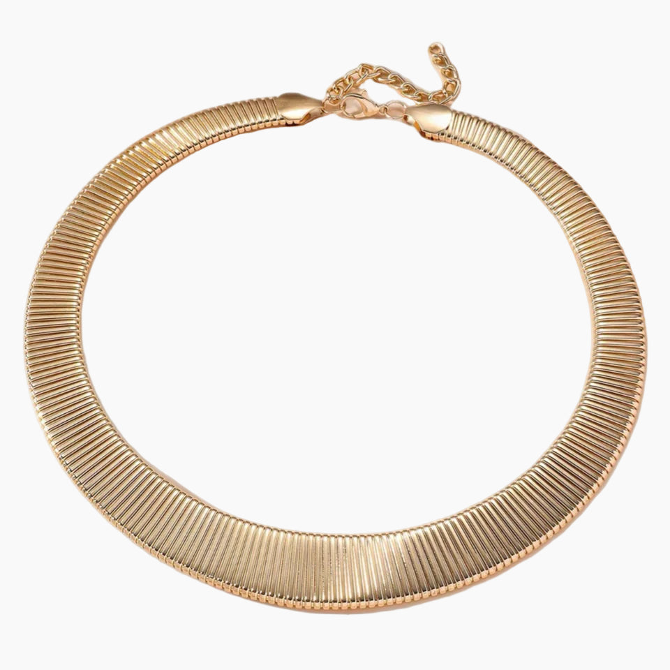 Gold necklace on a white background