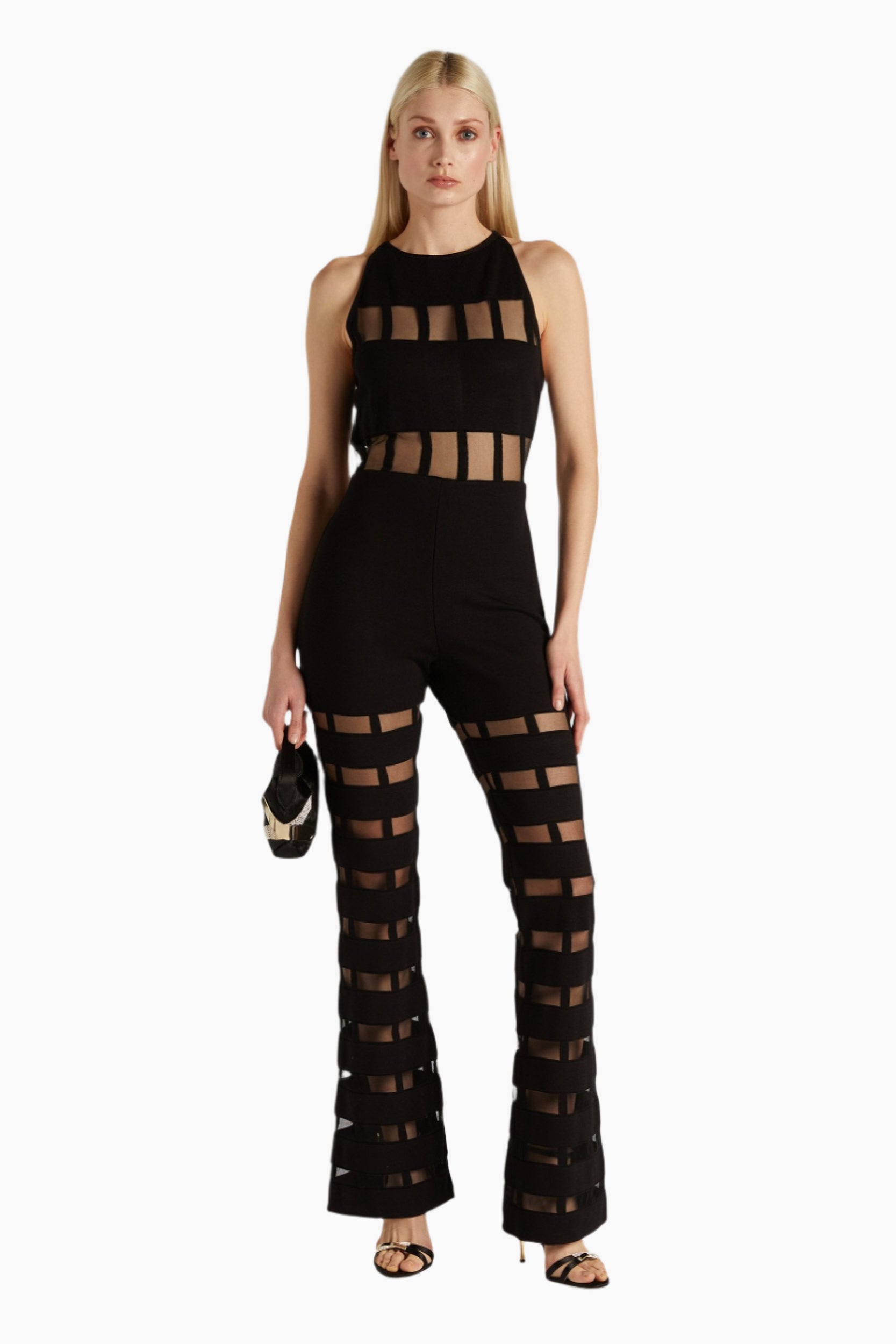 Woman wearing a black outfit with cut-out design