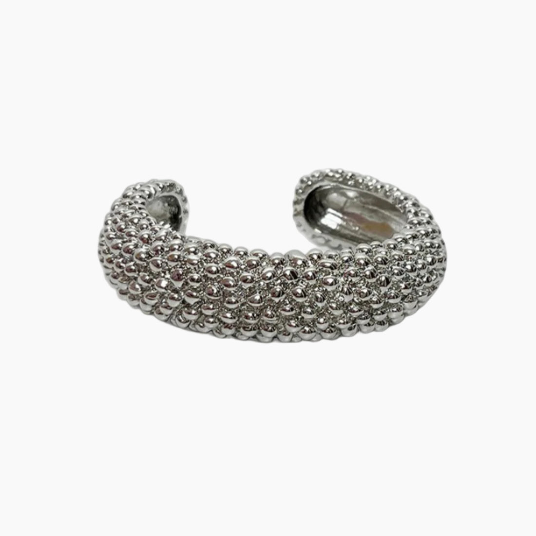 Silver beaded ring on a white background