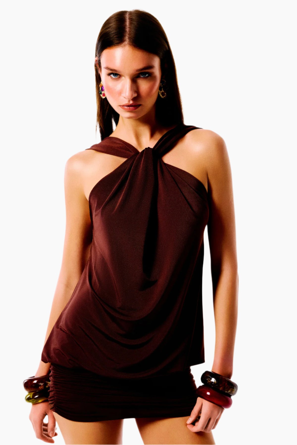 Woman wearing a brown halter neck dress