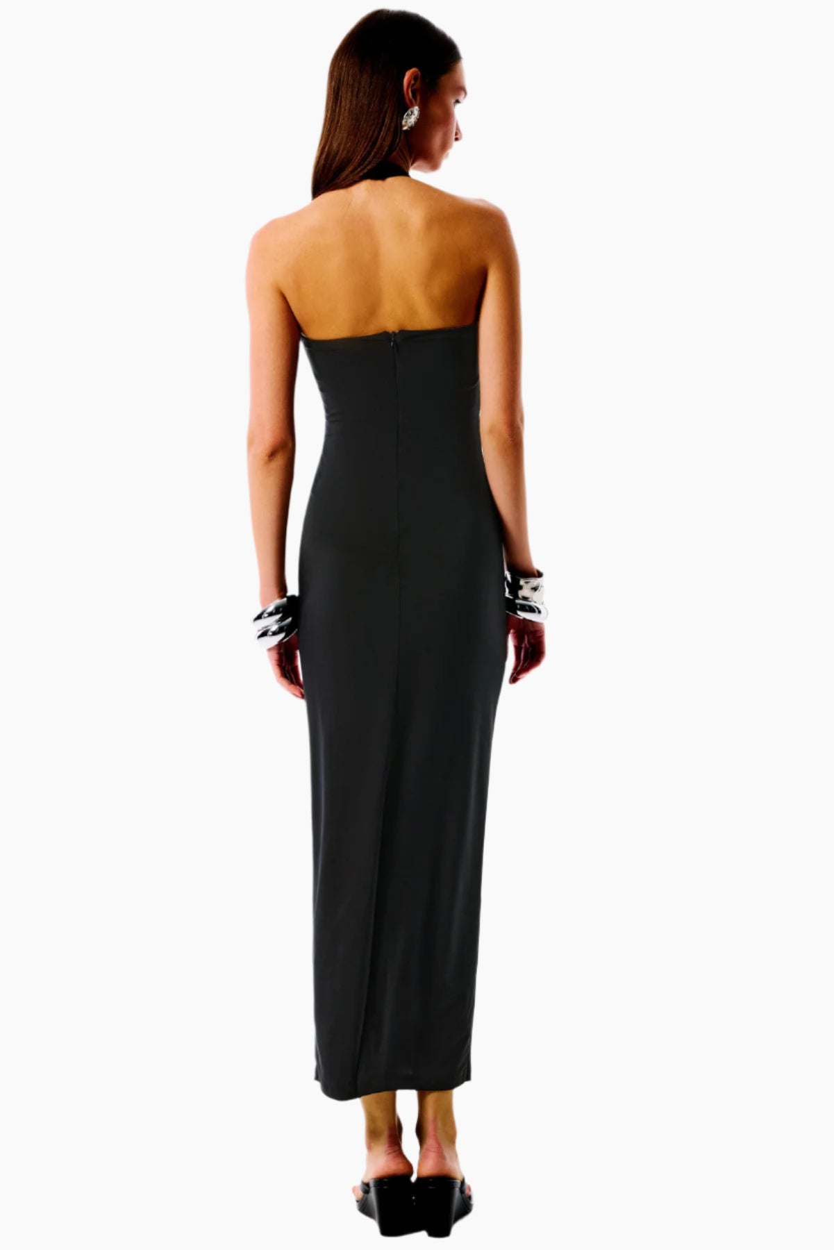Woman wearing a black strapless gown