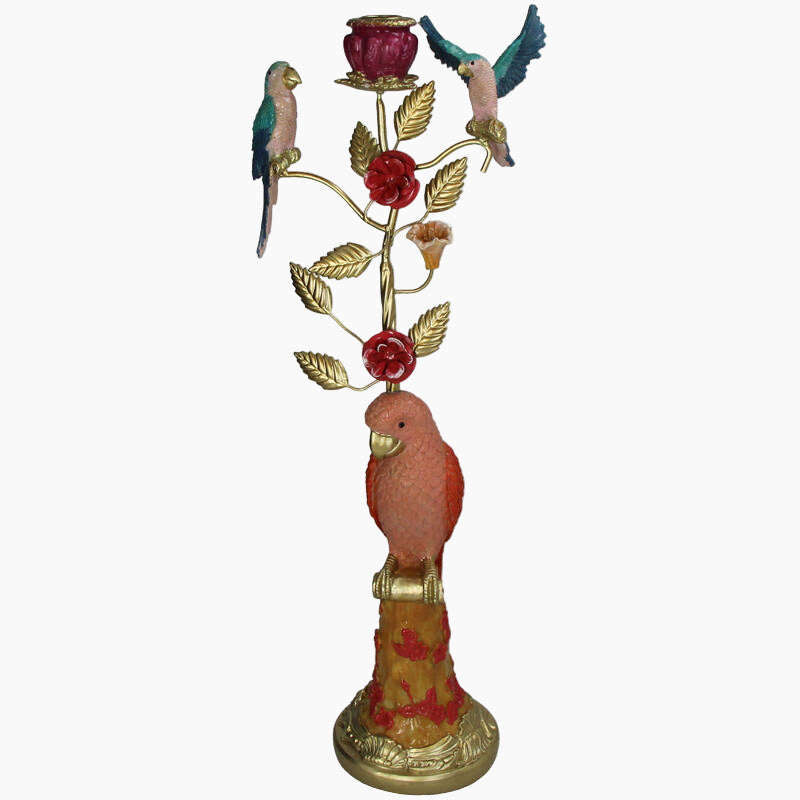 Decorative figurine with parrots on a branch with red flowers