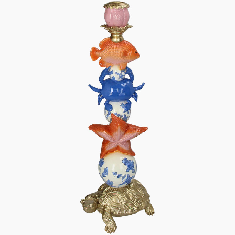 Decorative candle holder with turtle base, starfish, crab, and fish