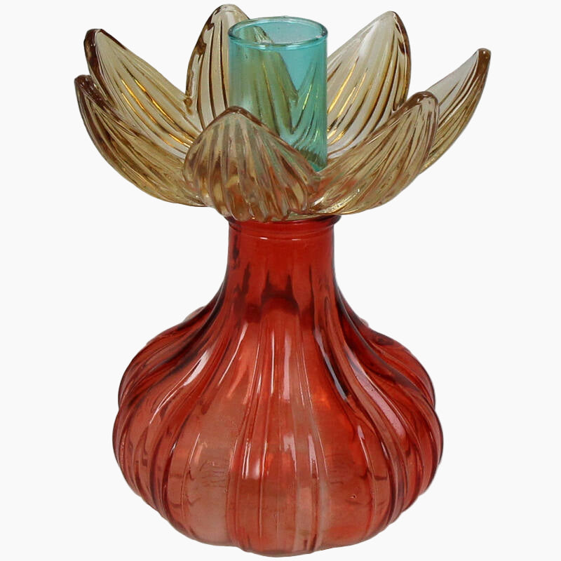 Decorative glass candle holder with a ribbed base and leaf-like top
