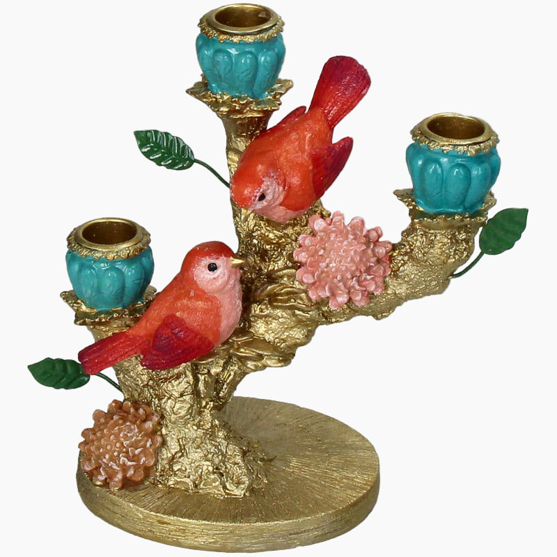 Decorative candle holder with red birds, blue vases, and pink flowers