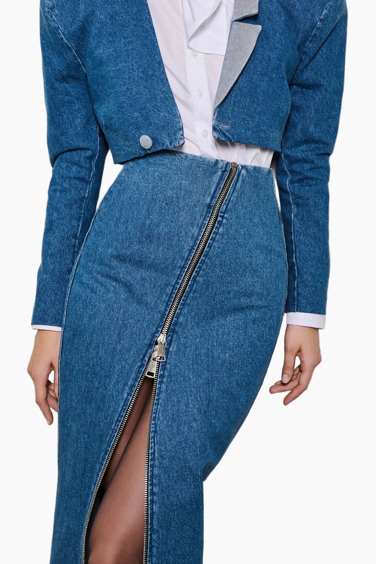 Blue denim dress with a front zipper on a white background