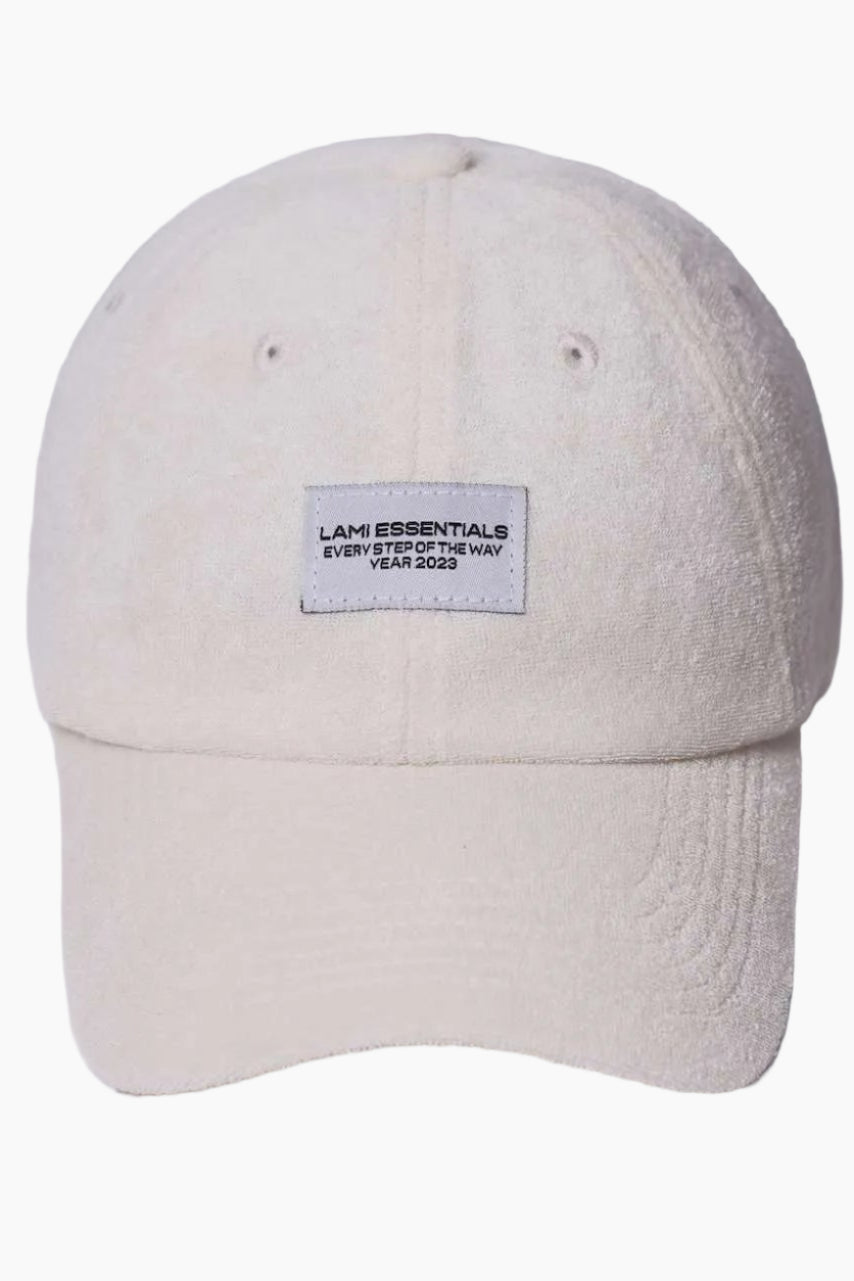 Beige cap with a small logo " Lami essentials"