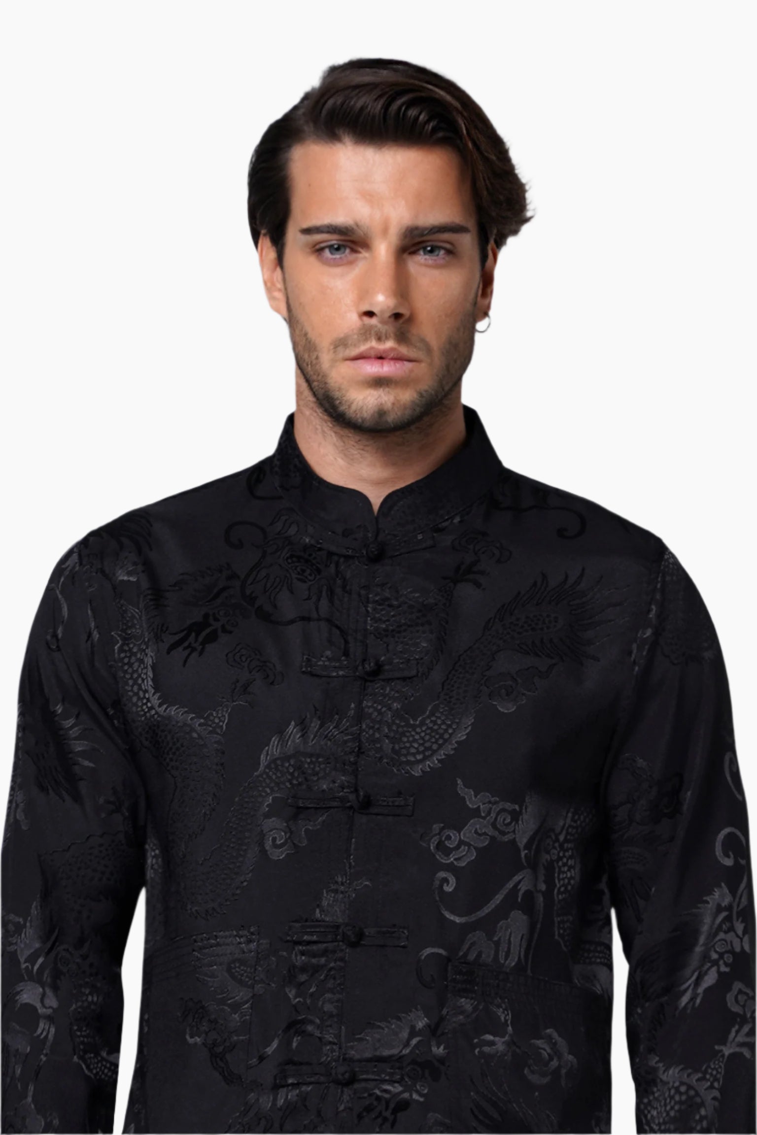 Man wearing a black patterned shirt