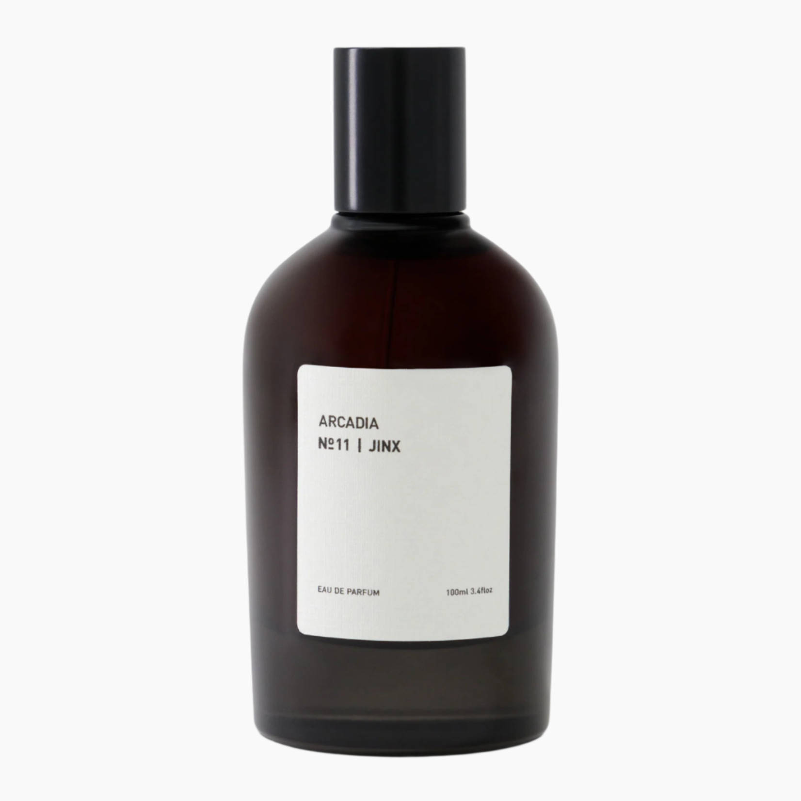 Brown bottle with a label on a white background, surrounded by nature-themed images. mber, musk, incense, tonka beans, cypriol and cambodian oud.