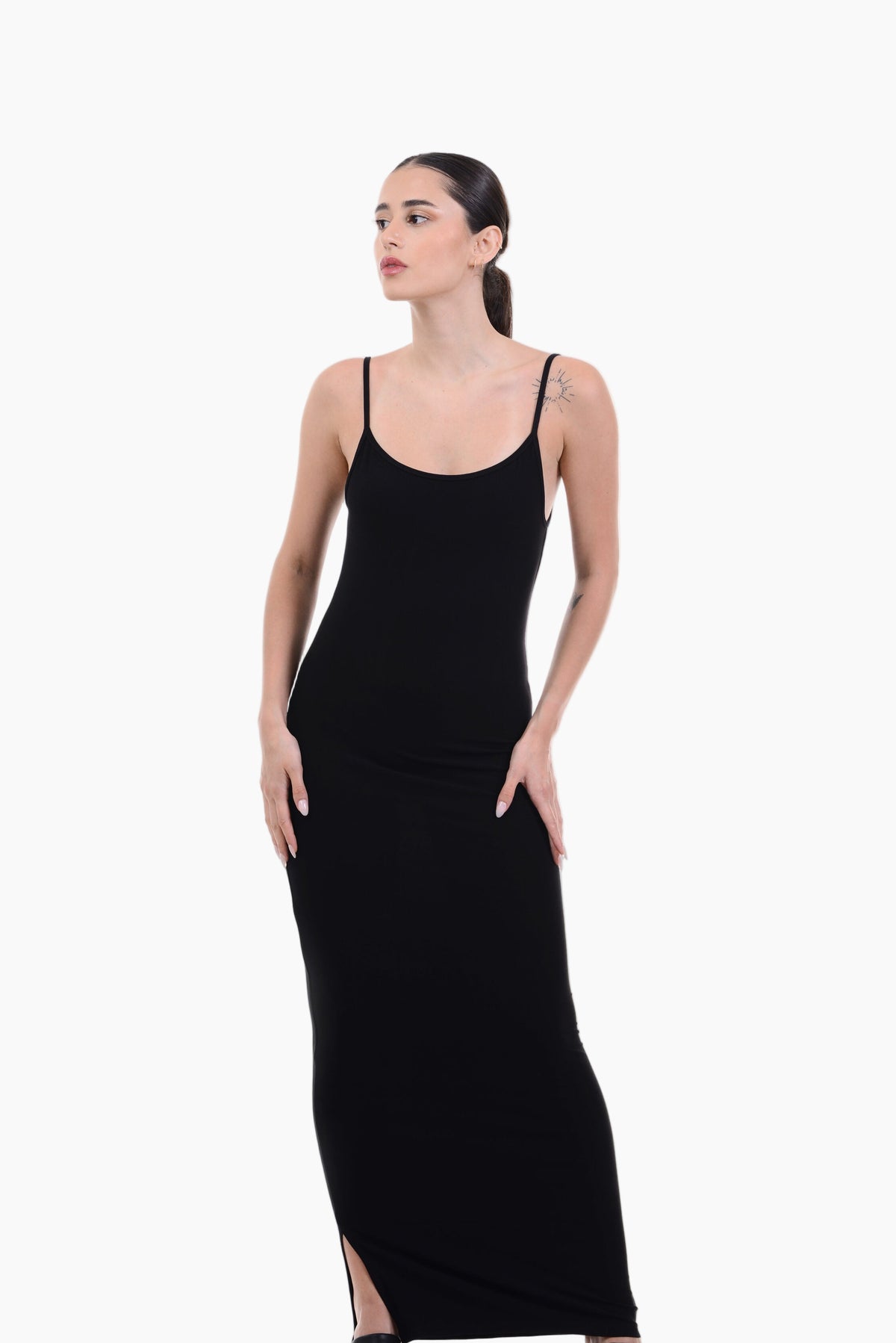 Woman wearing a black slip dress